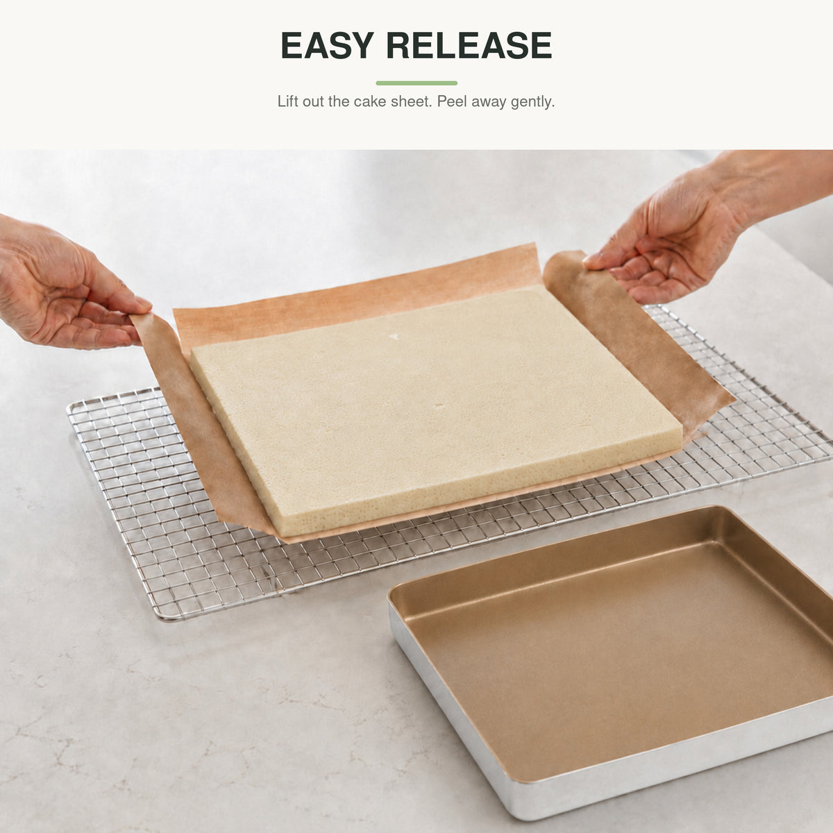 SANNENG baking liner lifting a baked cake sheet from the square pan