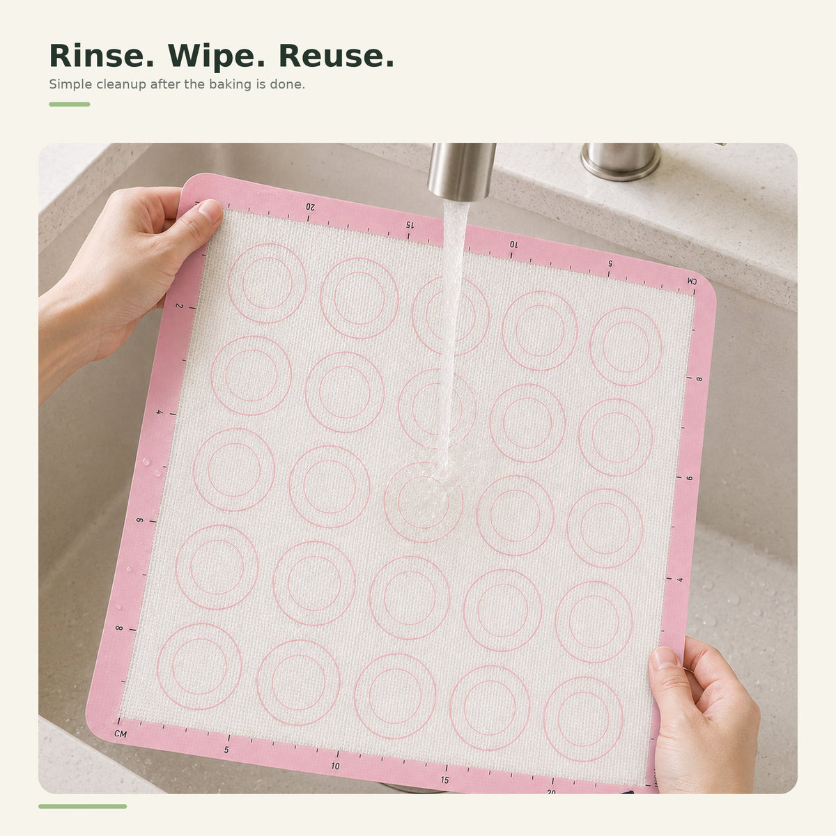 Silicone baking mat being rinsed clean in a sink