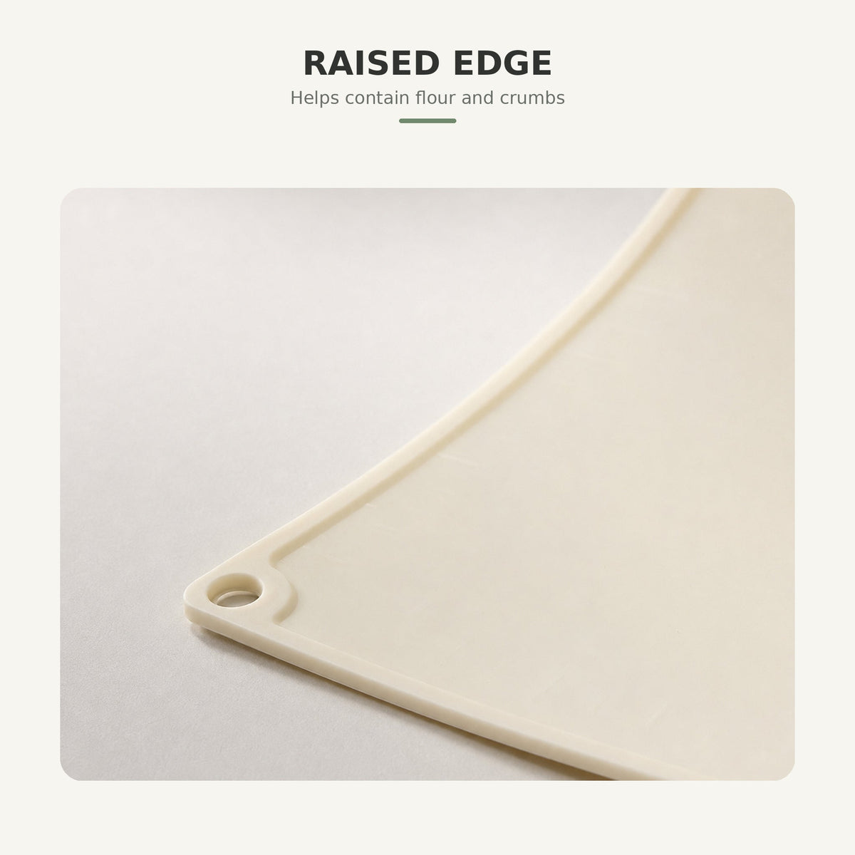 Raised edge detail on silicone pastry mat