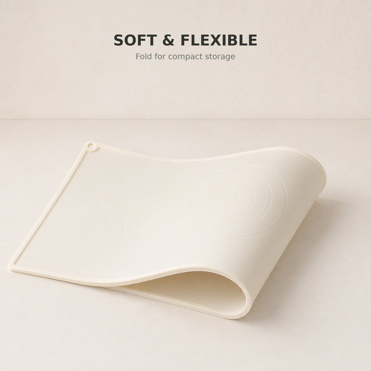 Flexible silicone pastry mat folded for compact storage